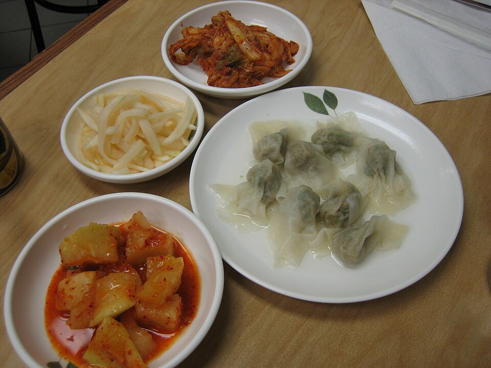 Korean mandu dumplings served with kimchi