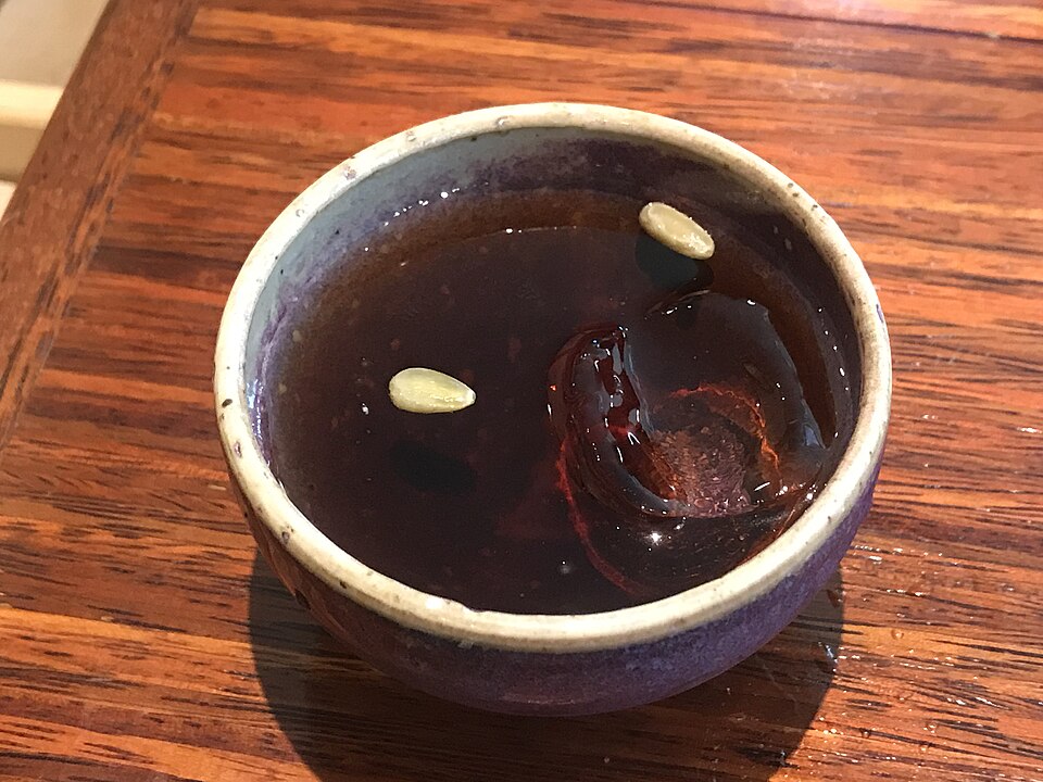 Korean sujeonggwa cinnamon punch with garnish